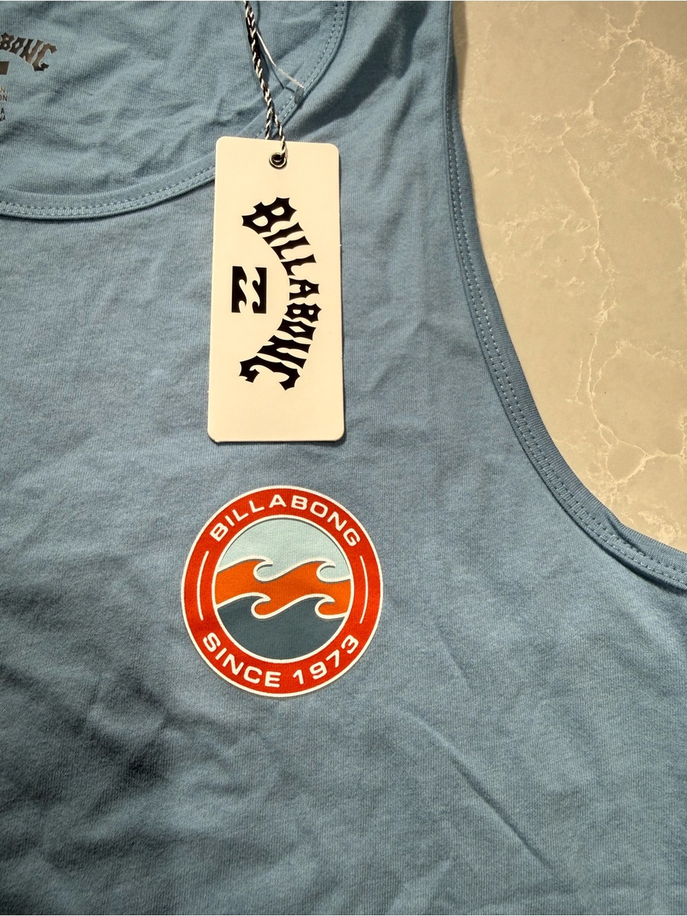 Billabong Light Blue Tank with Orange and White Wave Emblem